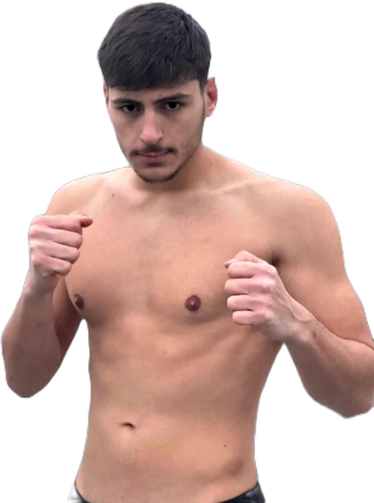 Miliadis Nikos staring into the camera with his fists raised